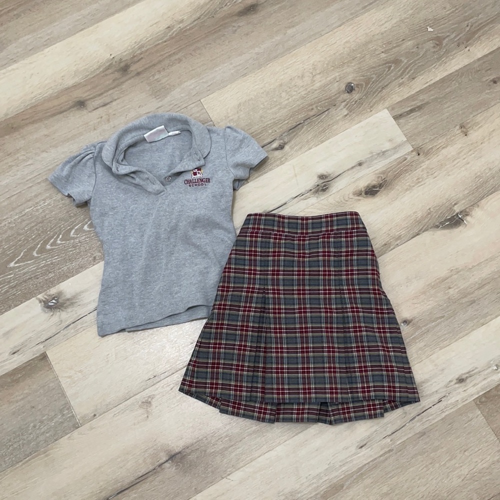 Kids Challenger School uniform. Grey polo shirt and plaid skirt